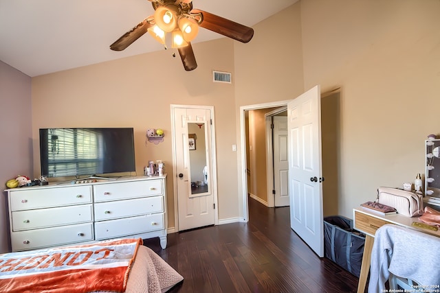 bedroom featuring dark hardwood / wood-style flooring, high vaulted ceiling, and ceiling fan