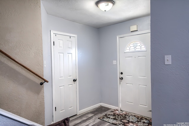 foyer featuring hardwood / wood-style floors