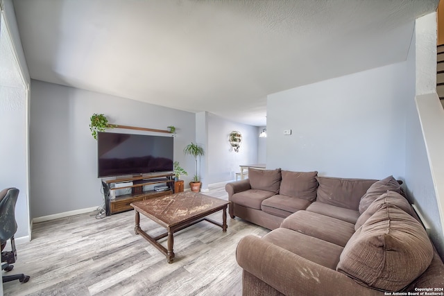 living room with light hardwood / wood-style floors