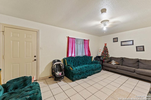 tiled living room with a textured ceiling