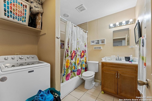 full bathroom with vanity, washer / clothes dryer, tile patterned floors, toilet, and shower / bath combo with shower curtain