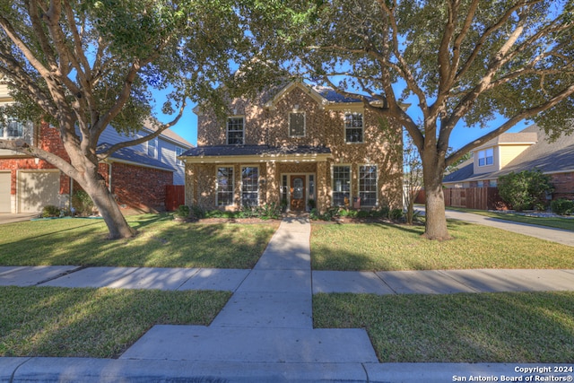 view of front of property with a front lawn