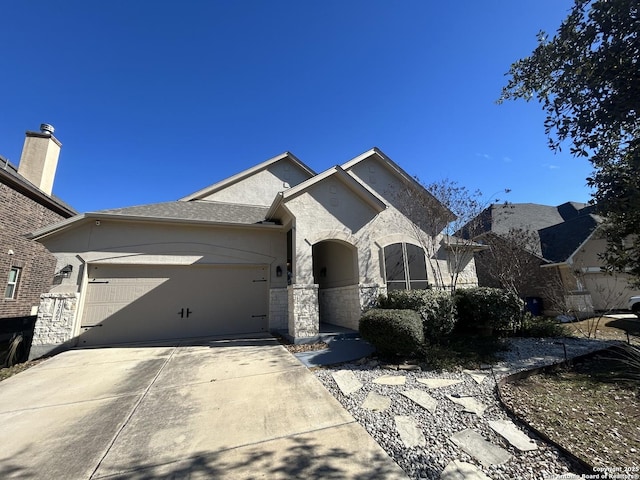 view of front of property with a garage