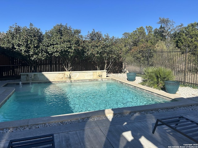 view of pool featuring pool water feature