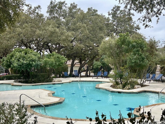 view of pool with a patio