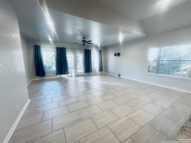 unfurnished room with ceiling fan