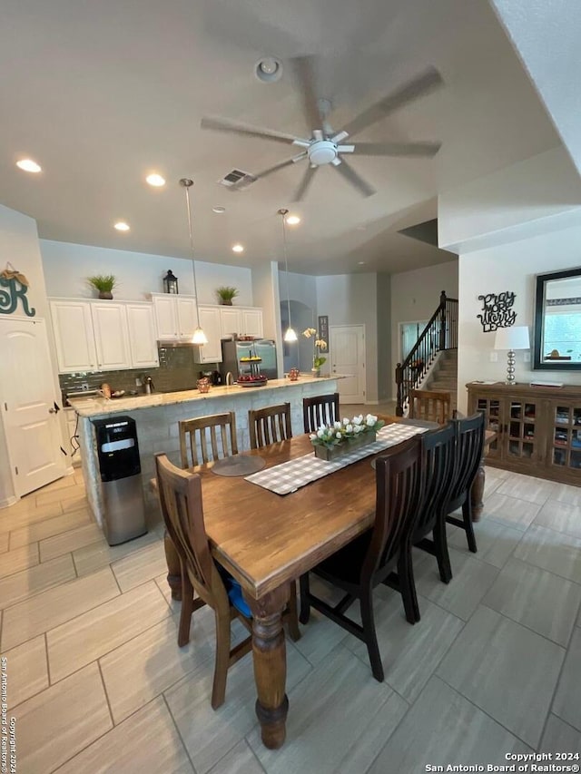 dining area with ceiling fan