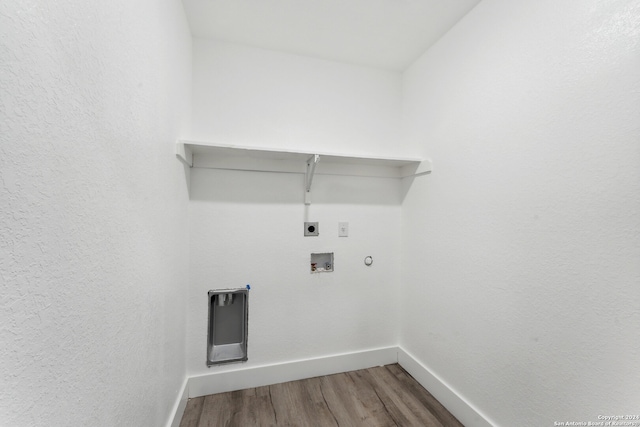 laundry area with electric dryer hookup, hookup for a gas dryer, hookup for a washing machine, and wood-type flooring