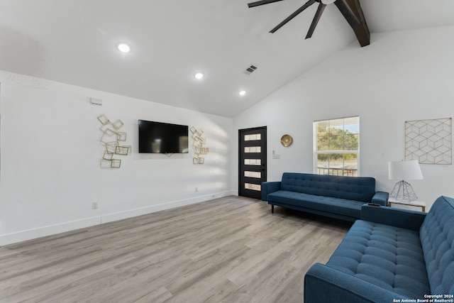 living room featuring ceiling fan, light hardwood / wood-style floors, beam ceiling, and high vaulted ceiling