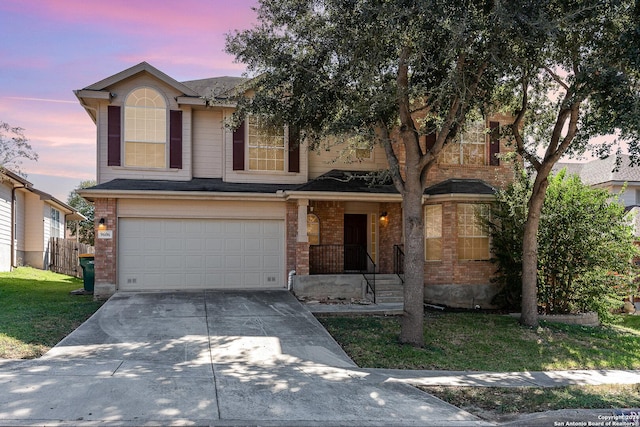 9606 Mediator Run, Converse, TX 78109 - traditional home with brick siding, an attached garage, and concrete driveway