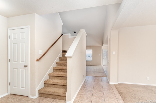 staircase with carpet