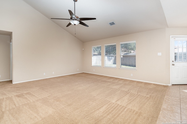 unfurnished living room featuring ceiling fan, light carpet, and high vaulted ceiling