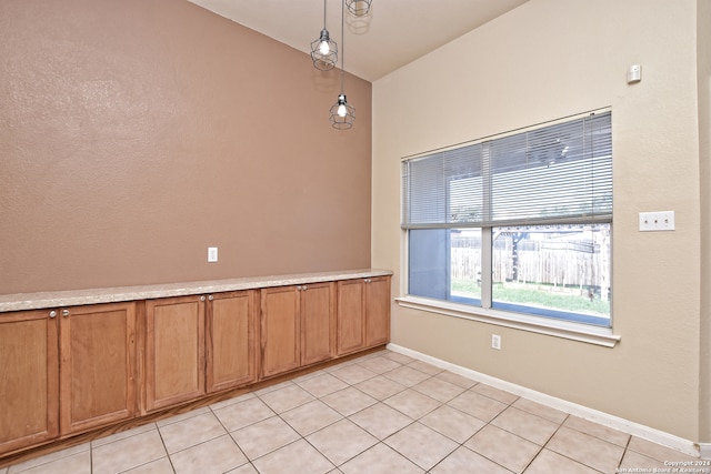 view of tiled spare room