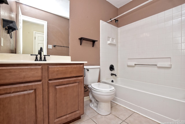 full bathroom featuring tile patterned flooring, vanity, toilet, and shower / bathtub combination