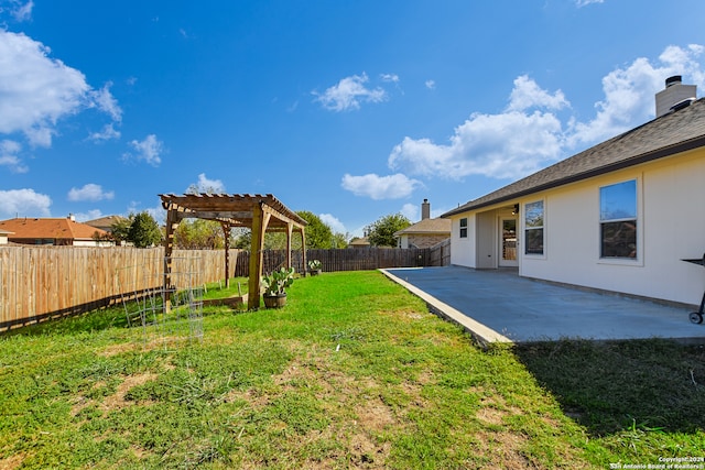 view of yard featuring a patio area and a pergola