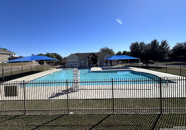 view of pool featuring a patio area