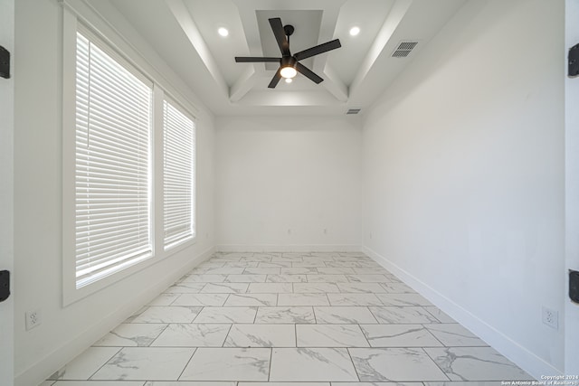 unfurnished room featuring vaulted ceiling, ceiling fan, and a healthy amount of sunlight