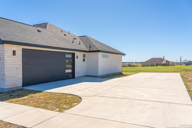 view of home's exterior featuring a garage