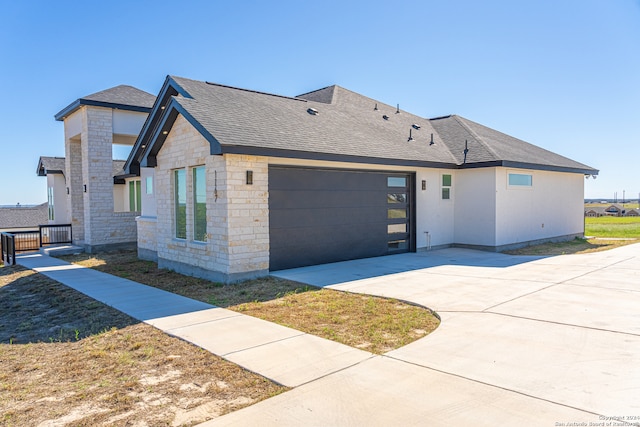 view of front of property with a garage