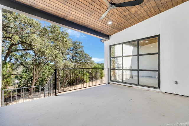 view of patio featuring ceiling fan