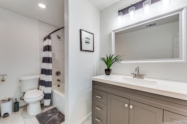 full bathroom featuring shower / tub combo, vanity, toilet, and tile patterned floors