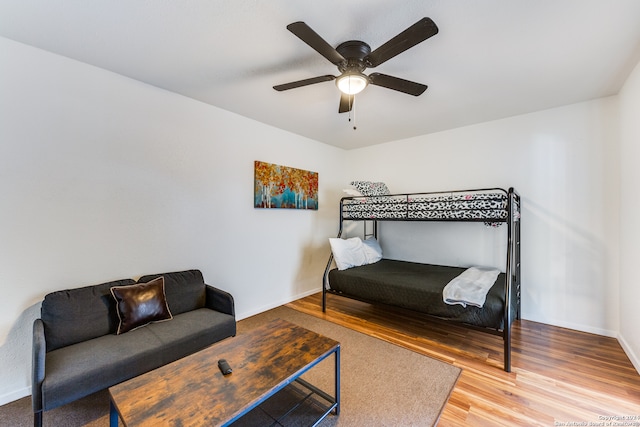 bedroom featuring ceiling fan and hardwood / wood-style floors