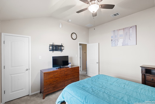 bedroom featuring ceiling fan, light colored carpet, and lofted ceiling