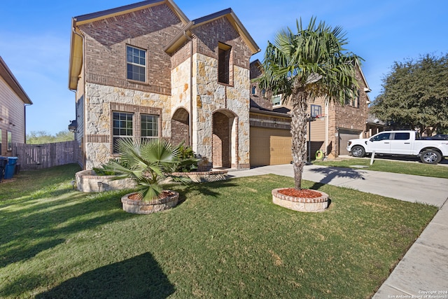 view of front facade featuring a front lawn and a garage