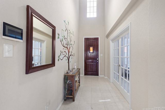 entryway featuring light tile patterned flooring