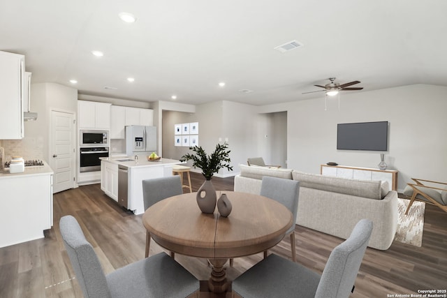 dining room with visible vents, recessed lighting, a ceiling fan, and dark wood-style flooring