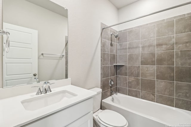full bath with toilet, vanity, and shower / tub combination