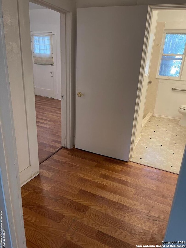 hall featuring hardwood / wood-style floors