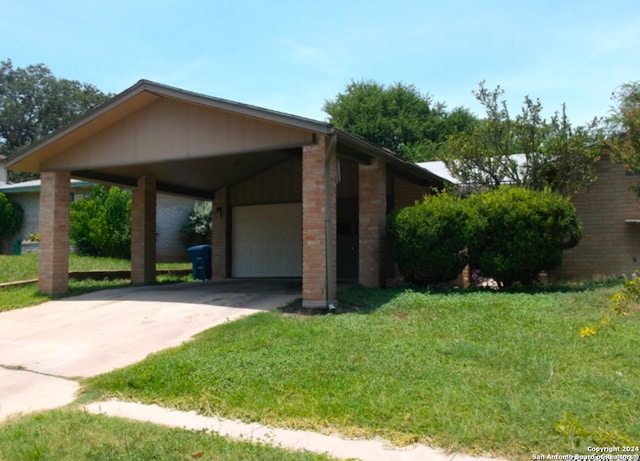 view of home's exterior featuring a lawn and a garage