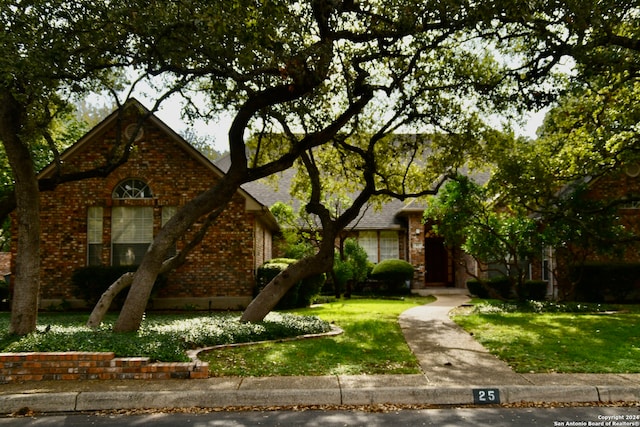 view of front of property with a front lawn