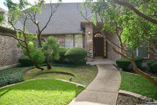 exterior space with a front yard