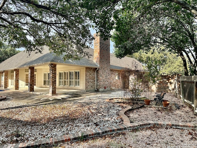 back of house featuring a patio area