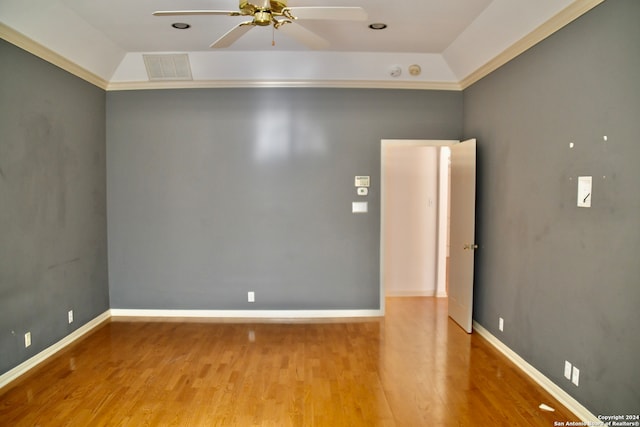 spare room with light hardwood / wood-style flooring, ceiling fan, and crown molding