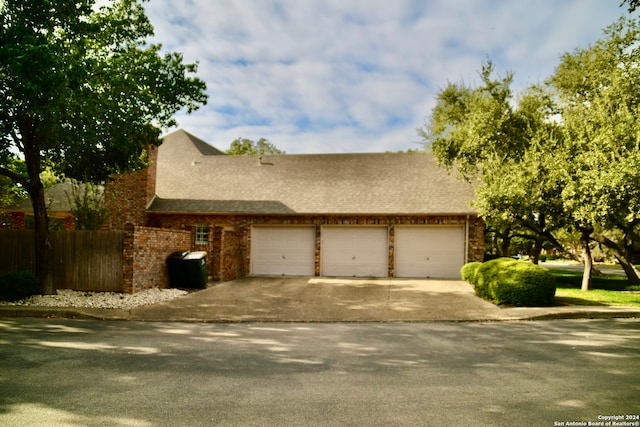 view of property exterior featuring a garage