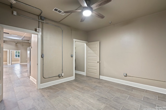 basement featuring ceiling fan