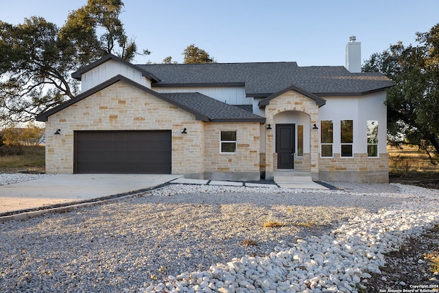 view of front of property with a garage