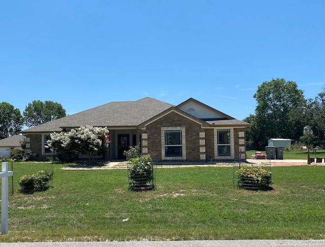 ranch-style house with a front yard