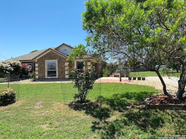 exterior space featuring a front lawn