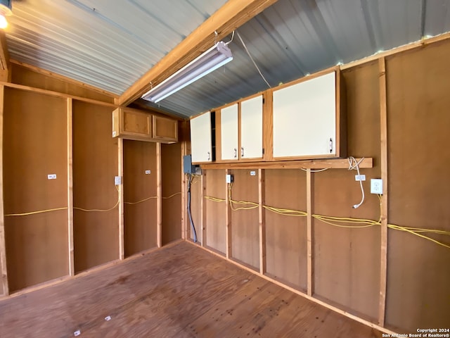 basement with wood-type flooring