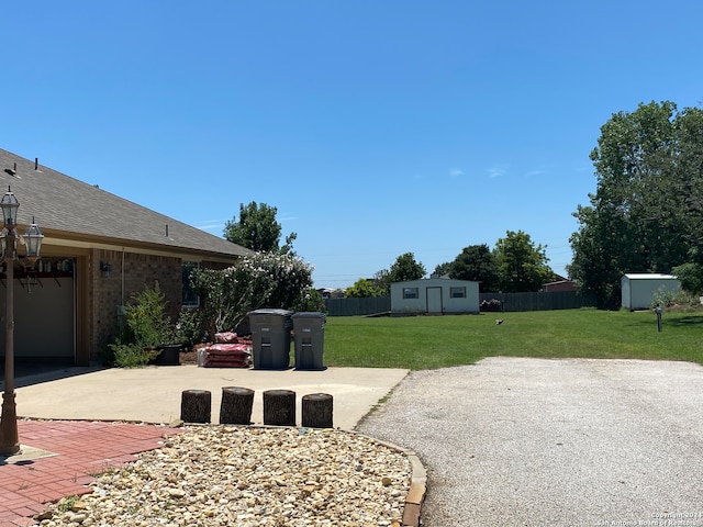 view of patio featuring a storage shed