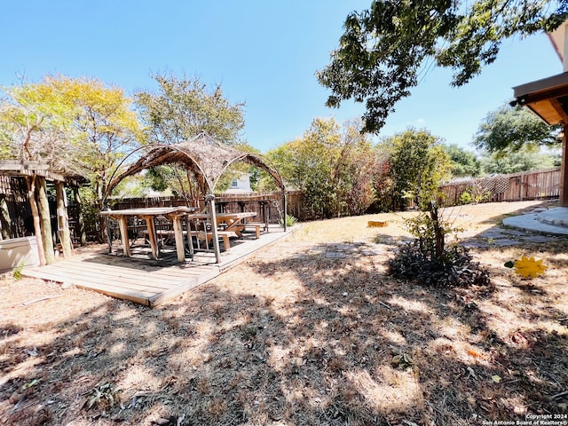 view of yard featuring a wooden deck