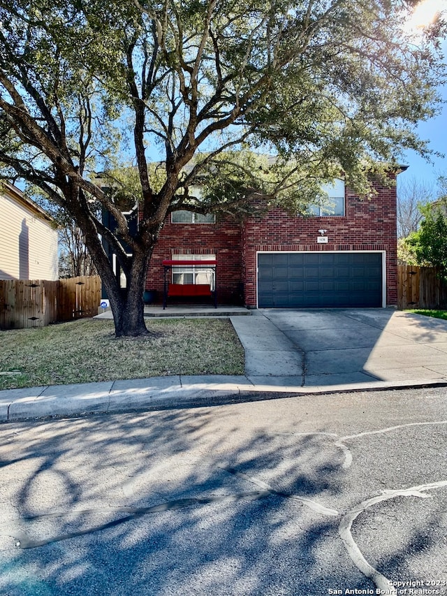 view of front of property with a garage