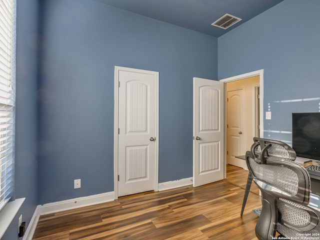 office space featuring hardwood / wood-style floors