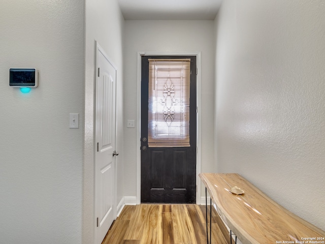 doorway to outside featuring hardwood / wood-style floors