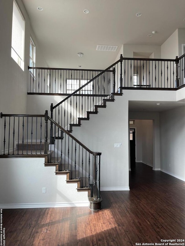 stairs with wood-type flooring