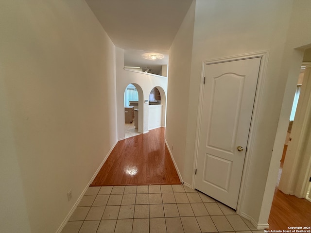 corridor featuring light hardwood / wood-style flooring